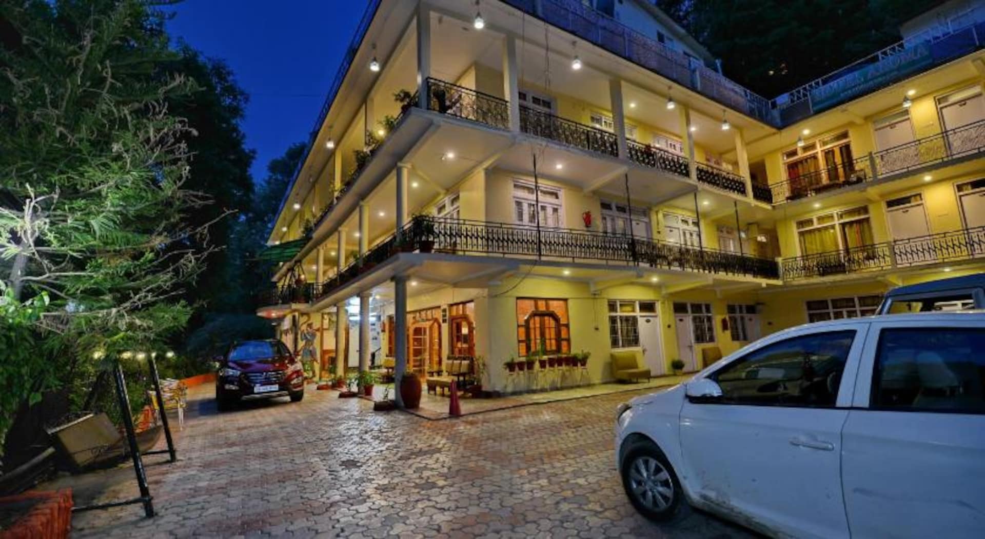 Best view of Hotel Aroma by Royal Collection hotel room, amenities, and facilities